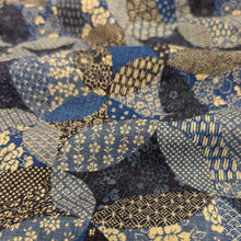 Load image into Gallery viewer, Flat lay of Japanese Cotton in Venn design. Available at Minerva's Bower. Fabric draped to show how it handles