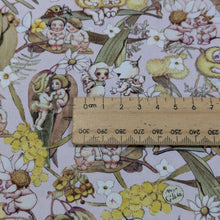 Load image into Gallery viewer, Close up of 100% Cotton, May Gibbs - Gossiping Gumnuts in Pink, for sale at Minerva's Bower, ruler included for scale