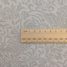 Load image into Gallery viewer, Close up of Japanese cotton with Strawberry Thief design in Grey, for sale at Minerva's Bower, ruler included for scale