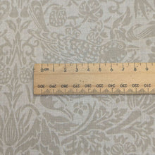 Load image into Gallery viewer, Close up of Japanese cotton with Strawberry Thief design in taupe, for sale at Minerva's Bower, ruler included for scale