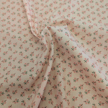 Load image into Gallery viewer, Drape of Japanese cotton fabric with a small floral pattern on a soft pink base, for sale at Minerva's Bower