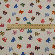 Load image into Gallery viewer, Flat lay of Ruby Star Society cotton, Ooh Lucky Lucky in white. Available at Minerva's Bower. Ruler included for scale