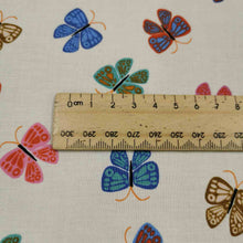 Load image into Gallery viewer, Flat lay of Ruby Star Society cotton, Ooh Lucky Lucky in white. Available at Minerva's Bower. Ruler included for scale
