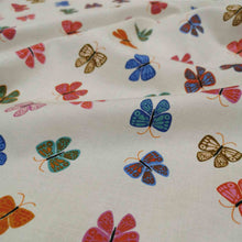 Load image into Gallery viewer, Flat lay of Ruby Star Society cotton, Ooh Lucky Lucky in white. Available at Minerva's Bower. Fabric draped to show how it handles