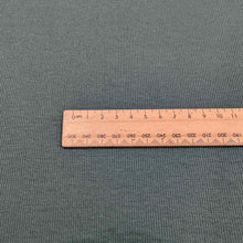 Load image into Gallery viewer, Flat lay of stellar rayon spandex rib in marine colourway. Available at Minerva's Bower. Ruler included for scale