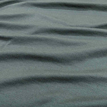 Load image into Gallery viewer, Flat lay of stellar rayon spandex rib in marine colourway. Available at Minerva's Bower. Fabric draped to show how it handles