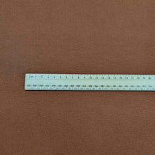 Load image into Gallery viewer, Flat lay of Stellar rayon rib in nutmeg colourway. Available at Minerva's Bower. Ruler included for scale