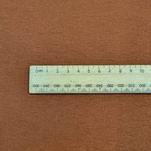Load image into Gallery viewer, Flat lay of Stellar rayon rib in nutmeg colourway. Available at Minerva's Bower. Ruler included for scale