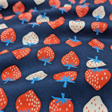 Load image into Gallery viewer, Flat lay of pure cotton, strawberries, by ruby star society. Made in Japan. Available at Minerva's Bower. Fabric draped to show how it handles