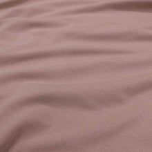 Load image into Gallery viewer, Flat lay of Olympia french terry in dusky pink. Available at Minerva's Bower. Fabric draped to show how it handles