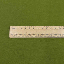 Load image into Gallery viewer, Flat lay of olympia heavyweight cotton spandex loopback in chartreuse colourway. Available at Minerva's Bower. Ruler included for scale