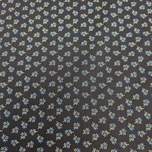 Load image into Gallery viewer, Japanese cotton fabric with a small floral pattern on a black base, for sale at Minerva's Bower