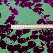 Load image into Gallery viewer, Flat lay of pure silk burnout velvet, in fuchsia floral design. Available at Minerva's Bower. Ruler included for scale