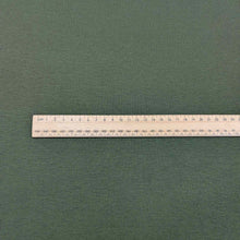Load image into Gallery viewer, Flat lay of Stellar rayon spandex rib knit in khaki colourway. Available at Minerva's Bower. Ruler included for scale