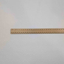 Load image into Gallery viewer, Flat lay of white Zola swiss dot embroidered pure cotton. Available at Minerva's Bower. Ruler included for scale