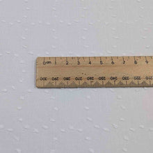 Load image into Gallery viewer, Flat lay of white Zola swiss dot embroidered pure cotton. Available at Minerva's Bower. Ruler included for scale