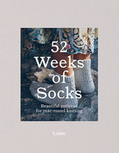 Load image into Gallery viewer, Book cover of '52 Weeks of Socks' with a person wearing knitted socks on a textured gray background, for sale at Minerva's Bower