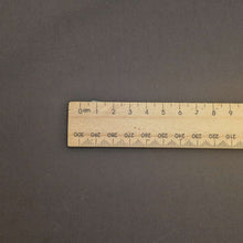 Load image into Gallery viewer, Close up of Air Washed Cotton Poplin, Black, for sale at Minerva&#39;s Bower, ruler included for scale