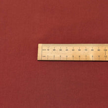 Load image into Gallery viewer, Close up flat lay of Air Washed Cotton Poplin, Dark Rust, ruler included for scale - for sale at MInerva's Bower