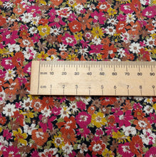 Load image into Gallery viewer, Close up flat lay of Amelie 100% Cotton Pinwale Cord by Kokka, Pink, ruler included for scale - for sale at Minerva's Bower