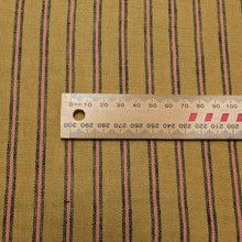 Load image into Gallery viewer, Close up flat lay of Atumnal Stripe 80% linen 20% cotton, ruler included for scale - for sale at Minerva's Bower