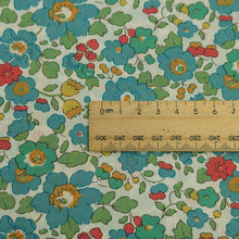 Load image into Gallery viewer, Close up flat lay of Liberty 100% Cotton Tana Lawn, Betsy D, with a ruler included for scale for sale at MInerva&#39;s Bower