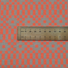 Load image into Gallery viewer, Close up flat lay of Ruby Star, Lofi 85% Cotton 15% Linen Bitmapped Neon Orange, ruler included for scale - for sale at Minerva's Bower