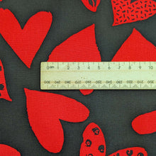 Load image into Gallery viewer, Close up flat lay of 100% Cotton Poplin, Black Heart for sale at Minerva&#39;s Bower, ruler included for scale