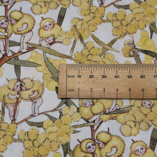 Load image into Gallery viewer, Close up flat lay of 100% Cotton May Gibbs Blossom Babies in White, ruler included for scale - for sale at Minerva's Bower