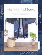 Load image into Gallery viewer, Book cover of &#39;the book of boro&#39; with a traditional Japanese textile design, available at Minerva&#39;s Bower
