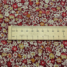 Load image into Gallery viewer, Close up flat lay of Claudia 100% Cotton Pinwale Cord in Red by Kokka, ruler included for scale - for sale at Minerva's Bower 