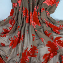 Load image into Gallery viewer, orange floral devore silk velvet on chocolate base. Available at Minerva's Bower. Fabric draped to show how it handles