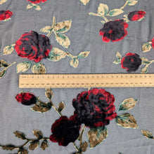 Load image into Gallery viewer, Floral pattern with red and black flowers on a dark background. Devore silk velvet, available at Mierva's Bower. Ruler included for scale