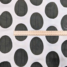 Load image into Gallery viewer, Flat lay of Crinkle Spot, a cream and Olive cotton Voile. Available at Minerva&#39;s Bower. A ruler is included for scale