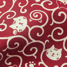 Load image into Gallery viewer, Red cotton fabric with white cat pattern. Made in Japan. Available at Minerva's Bower. Ruler included for scale