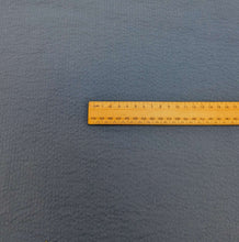 Load image into Gallery viewer, Flat lay of 100% Cotton Seersucker, Denim Blue, ruler included for scale, for sale at Minerva's Bower