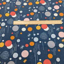 Load image into Gallery viewer, Colorful geometric patterned 100% cotton fabric on a blue background with a ruler for scale. For sale at Minerva&#39;s Bower