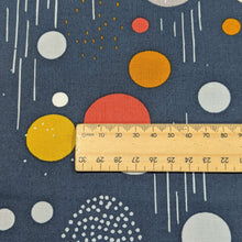Load image into Gallery viewer, 100% cotton Fabric with colorful geometric patterns on a blue background and a ruler for scale, for sale at MInerva&#39;s Bower