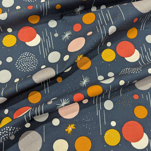 Draped 100% cotton Fabric with colorful geometric pattern on a blue background, for sale at Minerva's  bower