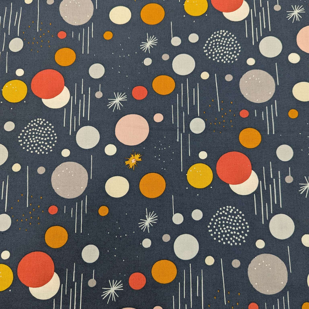 Patterned 100% cotton fabric with colorful circles and dots on a dark blue background, available at Minerva's Bower