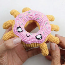 Load image into Gallery viewer, Spider Donut project from Creepigurumi book, available now at Minerva&#39;s Bower