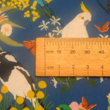 Load image into Gallery viewer, Close up flat lay of 100% Cotton, Aussie Backyard Dawn Chorus Blue, ruler included for scale - for sale at Minerva's Bower