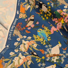 Load image into Gallery viewer, Flat drape of 100% Cotton, Aussie Backyard Dawn Chorus Blue, showing selvedge - for sale at Minerva's Bower