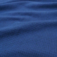 Load image into Gallery viewer, Flat lay of cotton linen dobby check in indigo. Available at Minerva&#39;s Bower. Fabric draped to show how it handles