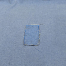 Load image into Gallery viewer, Washed swatch on unwashed cloth of Medium weight 100% cotton Donna Denim Chambray Twill rope dyed Japanese denim for sale at Minerva&#39;s Bower 