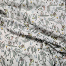 Load image into Gallery viewer, Flat drape of 70% Bamboo 30% Cotton Double Gauze, May Gibbs Garden Playtime, White - for sale at Minerva's Bower