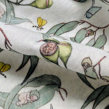 Load image into Gallery viewer, Close up of 70% Bamboo 30% Cotton Double Gauze, May Gibbs Garden Playtime, White - for sale at Minerva's Bower