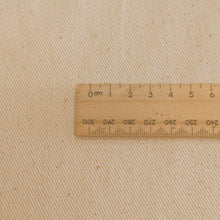 Load image into Gallery viewer, Close up of Heavyweight Washed Cotton Drill, Natural, for sale at Minerva&#39;s Bower, ruler included for scale