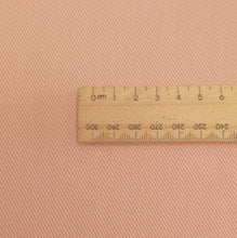 Load image into Gallery viewer, Close up of Heavyweight Washed Cotton Drill, Pink, for sale at Minerva&#39;s Bower, Ruler included for scale