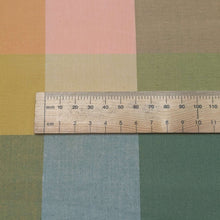 Load image into Gallery viewer, Close up flat lay of Fableism Lumiere Happy Checkers Bloom Cotton, ruler included for scale - for sale at Minerva's Bower